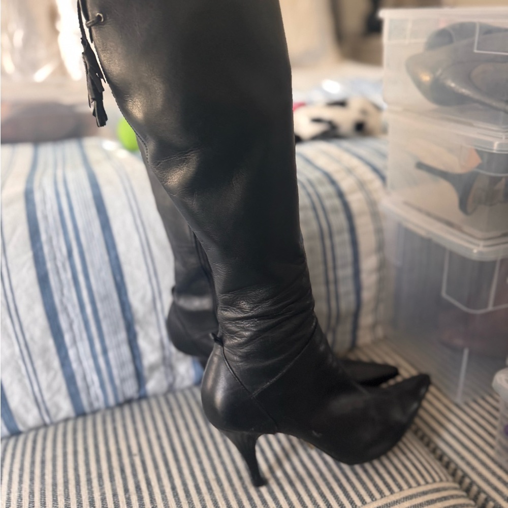 Sleek Black tall leather Boots with Stiletto Heel